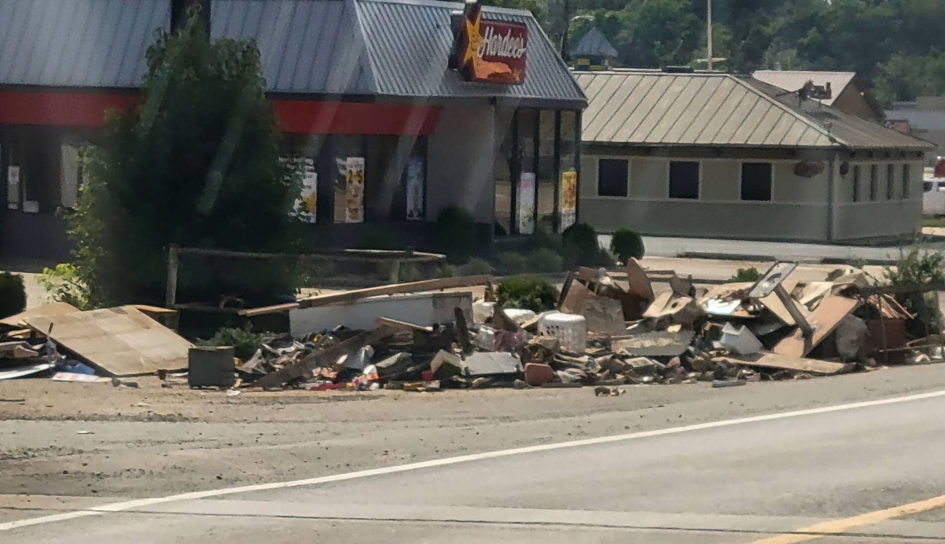 Flood debris at a Lewis County business during reopening work